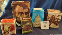 Five boxed Avon Americana decanters visible