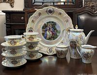 Full view of tea set and cake plate showing all pieces