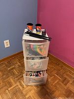 Full view of 3-drawer cart with items on top and in drawers