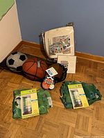 All items in packaging: quilt set, three plush pillows, two curtain panels