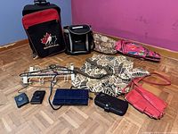 Overview of all bags, purses, wallets, hangers laid out