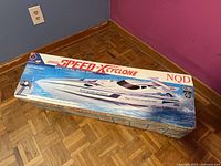 Factory box showing model graphics and branding