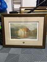 Full view of framed lithograph showing artwork, matting and frame