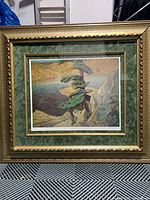 Frontal view of framed lithograph showing artwork, frame, matting