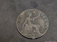 Reverse of 1902 one penny coin showing seated Britannia and date