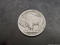 Reverse of 1936 Buffalo Nickel showing bison and denomination