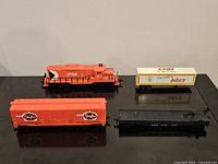 Group view: locomotive, boxcar, trailer, flatcar