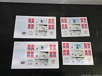 Four first day covers laid out