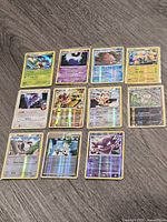 All eleven cards laid out on floor