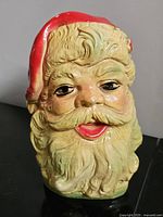 Front view of Santa Claus chalkware figurine
