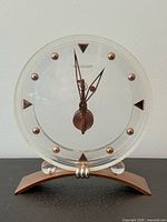 Front view of Jaeger-LeCoultre lucite mantle clock