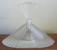 Full view of frosted glass pyramid perfume bottle front