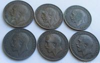 Obverse side of six George V farthings showing king's portrait and legend