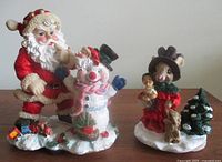 Both figurines side by side to show scale and overall appearance