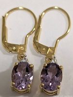 front view of both leverback earrings showing amethysts