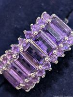 Close-up of amethyst stones and prong settings