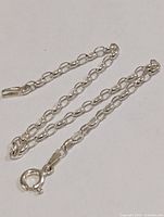 Close view of sterling silver bracelet links and clasp