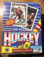 Closed box top showing graphics, year, and players