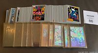 Stacked 180-card base set with hologram cards in sleeves