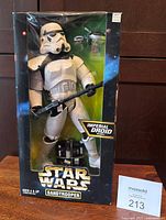 Front view of boxed Sandtrooper figure and accessories