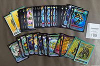 All 65 Digimon cards spread out, holographic cards visible