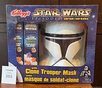 Front of sealed Kellogg's Star Wars Episode II cereal package with window showing Clone Trooper mask and two cereal boxes