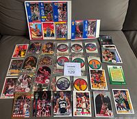 Overall view of cards, stickers and discs spread on surface