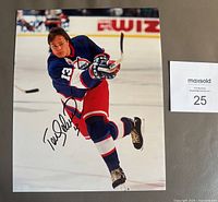 Full view of signed 8x10 photo with jets uniform and signature visible