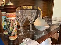 Overall lot showing mills, crystal glasses, Lenox bowl, glass platters