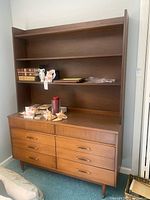 Front view of dresser with hutch showing drawers, shelves, hardware