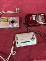 All three cameras arranged together showing fronts