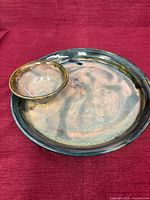 Top view showing plate with dipping bowl, glaze pattern visible