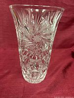 front view of flared clear lead crystal vase showing starburst cuts