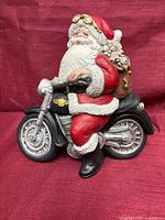 Full view of Santa on motorcycle figurine