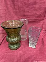 Group shot of all three vases showing shapes, sizes, colors