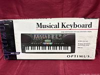Front view of Optimus MD-500 keyboard box