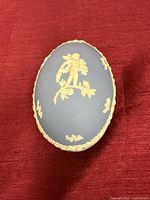 Top view showing cherub and garland relief on lid