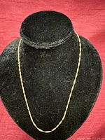 Full view of necklace draped on display bust