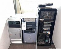 Three desktop towers: silver HP, grey HP, black Dell