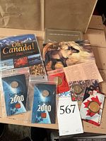 Group shot of all six packaged coin items