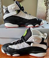 Lateral view of both shoes showing colorway and overall condition