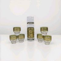 Full set showing pitcher centered and six glasses arranged