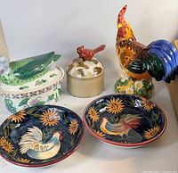Group shot of all five ceramic bird-themed pieces