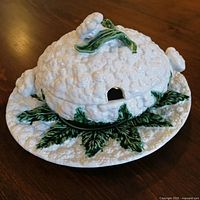 Complete tureen with lid on platter