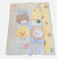 Full view of quilt front showing animal panels and overall design