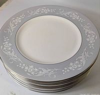 Stack of eight Valleyfield dinner plates showing face pattern