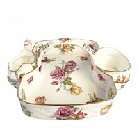 Front view of tray with creamer and sugar bowl positioned