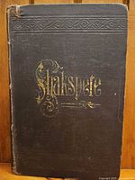 Front cover showing gilt "Shakspere" title and cloth binding