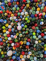 Close-up of assorted marbles showing colours, patterns and sizes