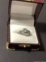 Ring set in presentation box showing overall appearance